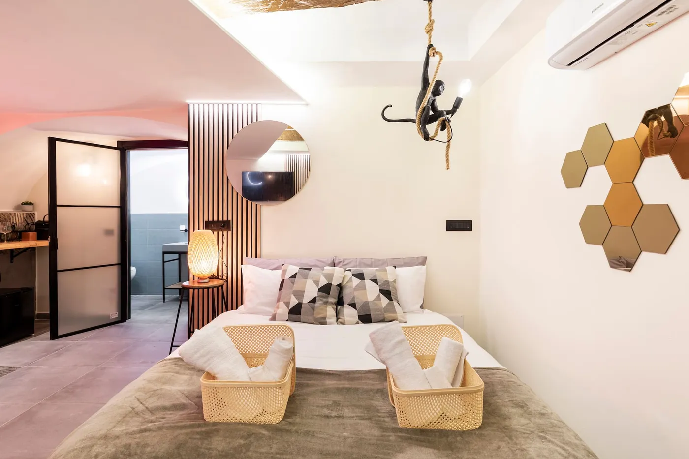 Queen-size bed under antique beams